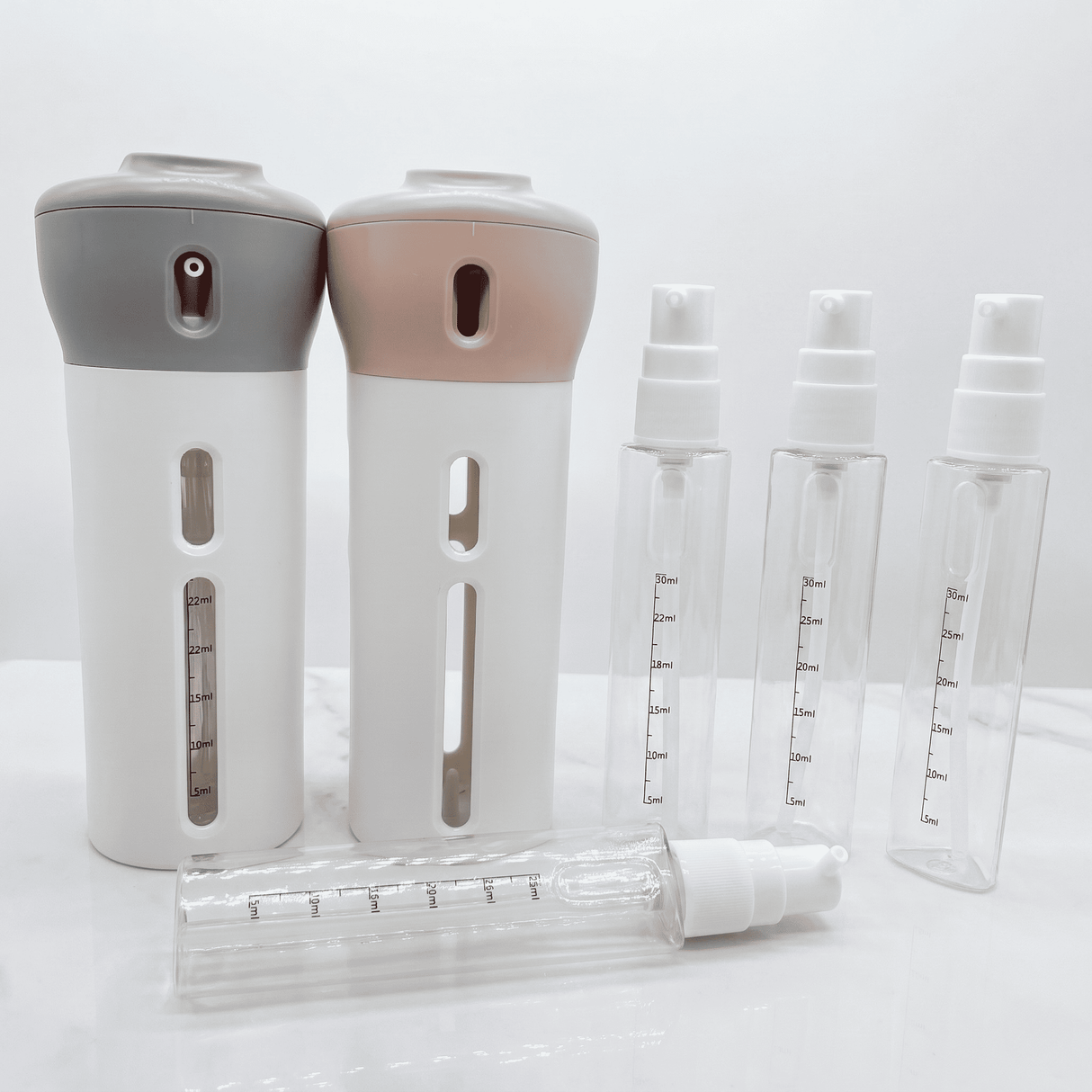 SpinFill – 4-in-1-Drehspender für unterwegs mit auslaufsicheren 40-ml-Nachfüllflaschen – Kompakte Reiseflasche