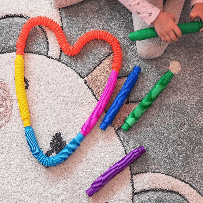 Buntes Pop Tube Spielzeug - Sensorisches und dehnbares Spiel für die Kreativität und Motorik von Kindern