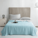 SIXTEN – Kylande Sval Täcke i 100% Polyester med Q-max 0,44 – Twin eller Queen